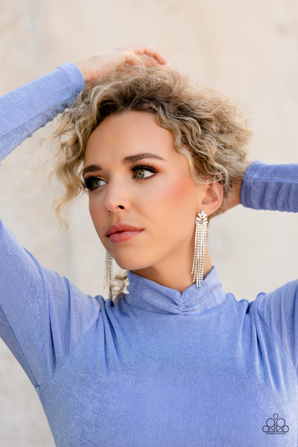 Paparazzi Accessories Overnight Sensation - Multi Sparkly strands of dainty white rhinestones stream out from the bottom of a silver frame made up of a staggered collection of iridescent and trapezoidal cut rhinestones, resulting in a timeless tassel. Ear