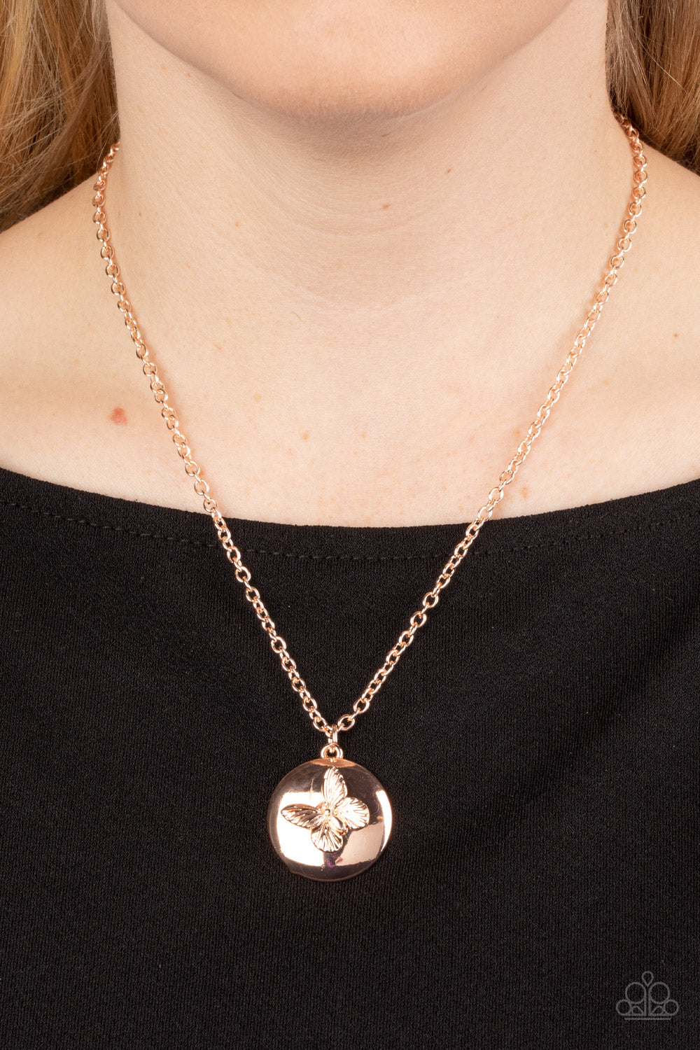 Paparazzi Accessories Monarch Meadow - Gold A dainty rose gold butterfly flutters atop a beveled rose gold disc, resulting in a whimsical pendant at the bottom of a classic rose gold chain. Features an adjustable clasp closure. Sold as one individual neck
