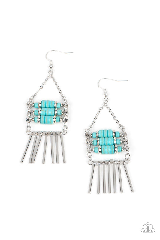 Paparazzi Accessories Tribal Tapestry - Blue Rows of cylindrical silver and turquoise stone beads are threaded along metal rods between faceted silver cubes. Silver rods stream out from the bottom of the stacked display, resulting in an earthy fringe. Ear
