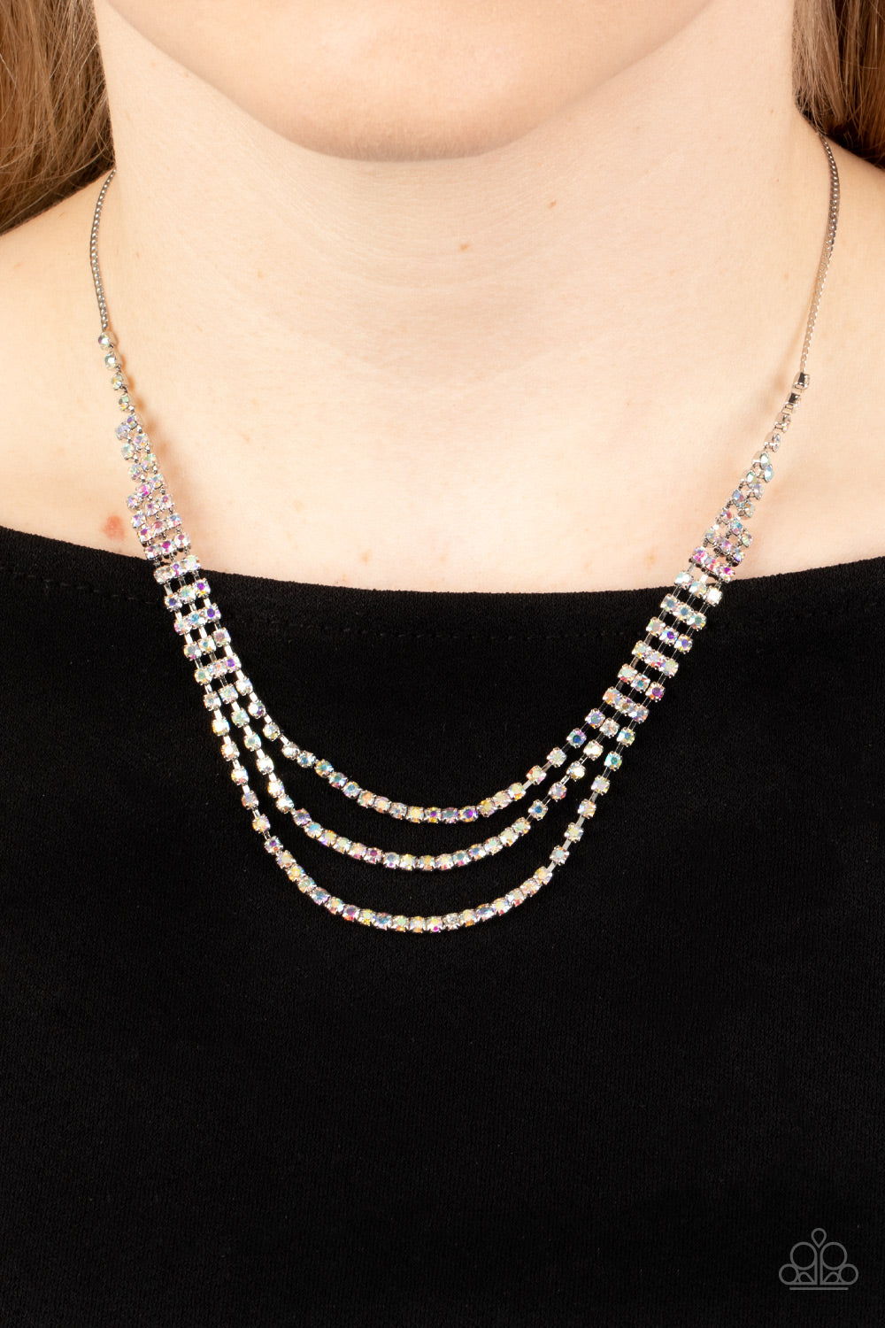 Paparazzi Accessories Surreal Sparkle - Multi Featuring square fittings staggered rows of iridescent rhinestones cascade from a dainty silver snake chain below the collar. The interconnected rows delicately give way to freefalling layers, adding glitzy mo