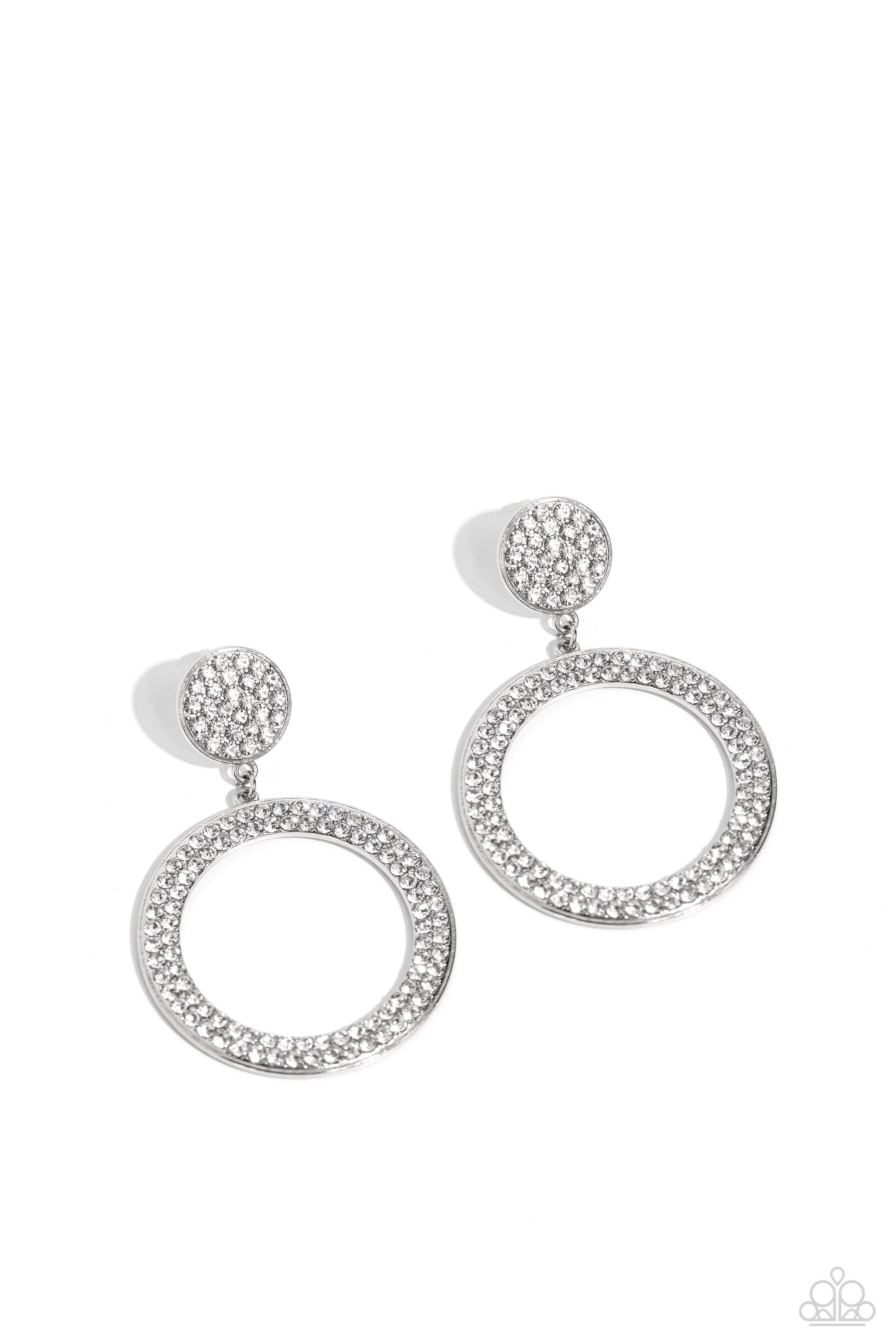 Paparazzi Accessories GLOW You Away - White Encrusted in rows of glassy white rhinestones, a flat silver hoop swings from the bottom of a white rhinestone dotted silver frame for a statement-making finish. Earring attaches to a standard post fitting. Sold