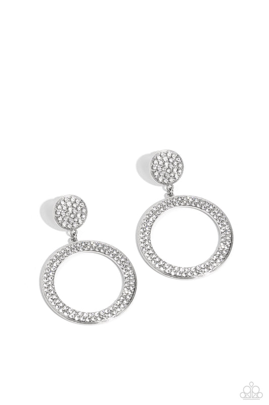 Paparazzi Accessories GLOW You Away - White Encrusted in rows of glassy white rhinestones, a flat silver hoop swings from the bottom of a white rhinestone dotted silver frame for a statement-making finish. Earring attaches to a standard post fitting. Sold