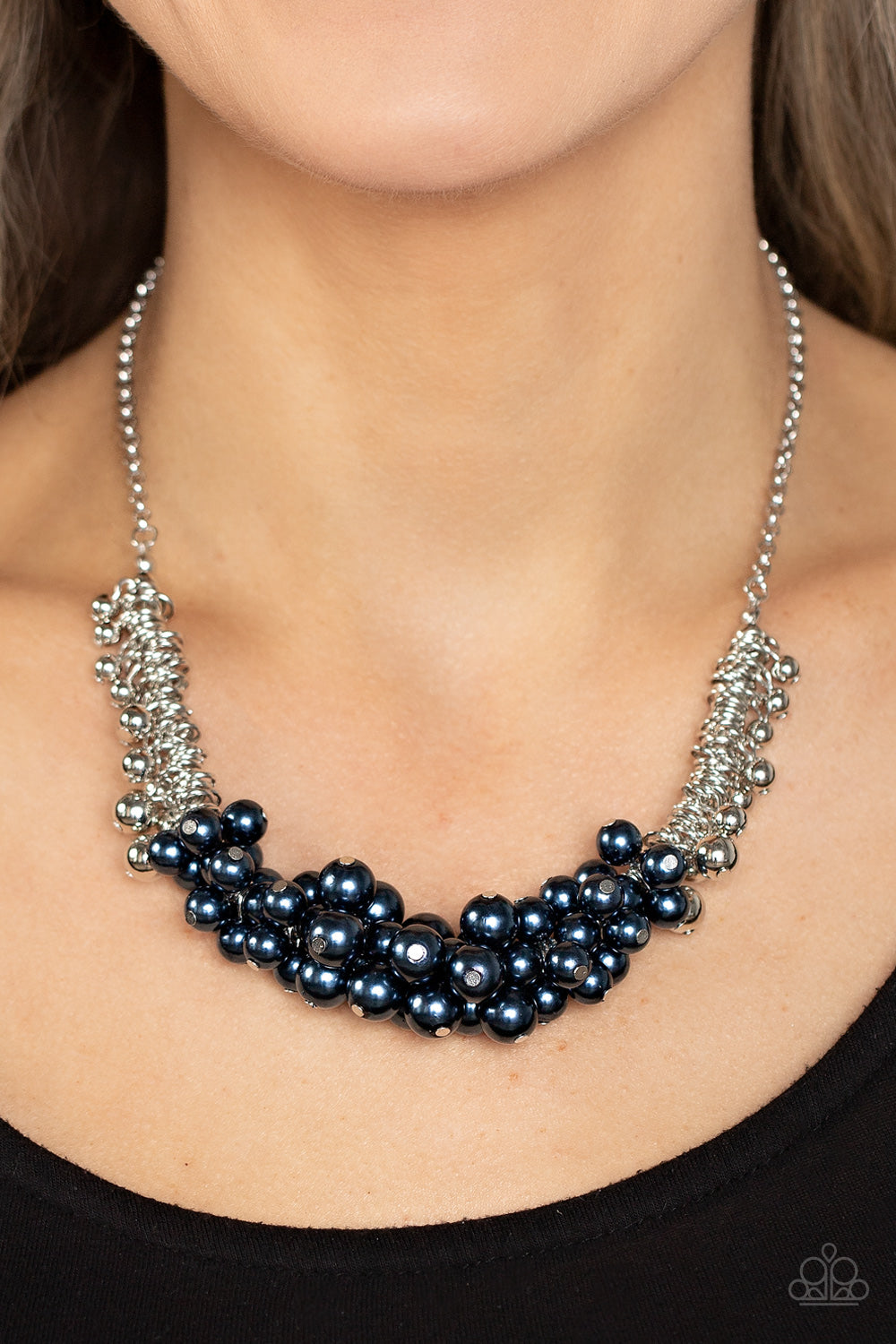 Paparazzi Accessories Bonus Points - Blue A bubbly cluster of blue pearls are bunched together between hanging silver beads that dangle between jampacked rows of silver rings, resulting in exaggerated effervescence below the collar. Features an adjustable