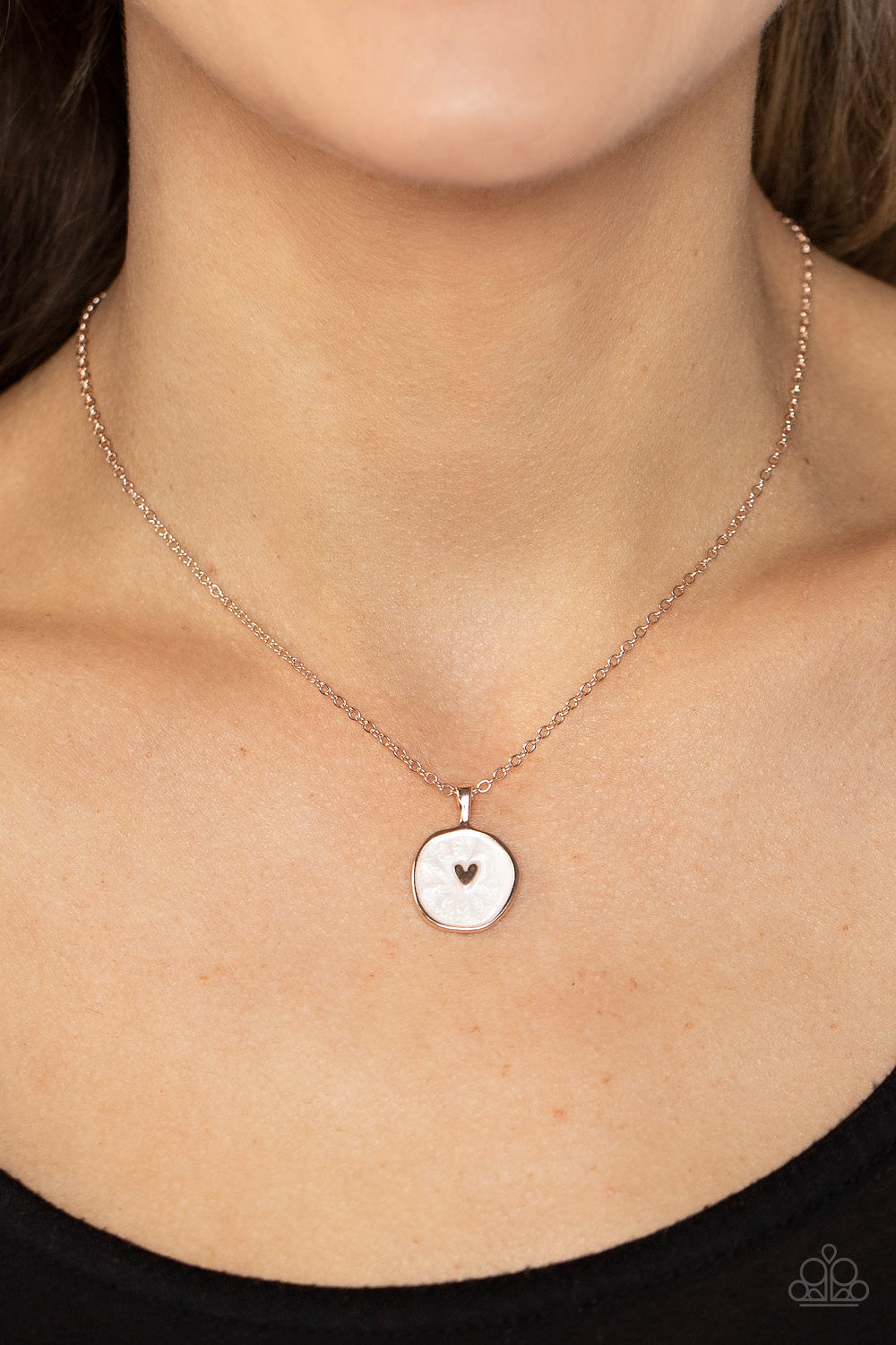 Paparazzi Accessories Do What You Love - Gold Painted in a shimmery white lacquer finish, an asymmetrical rose gold disc is dotted in a dainty rose gold heart accent as it swings from the bottom of a dainty rose gold chain below the collar for a charming