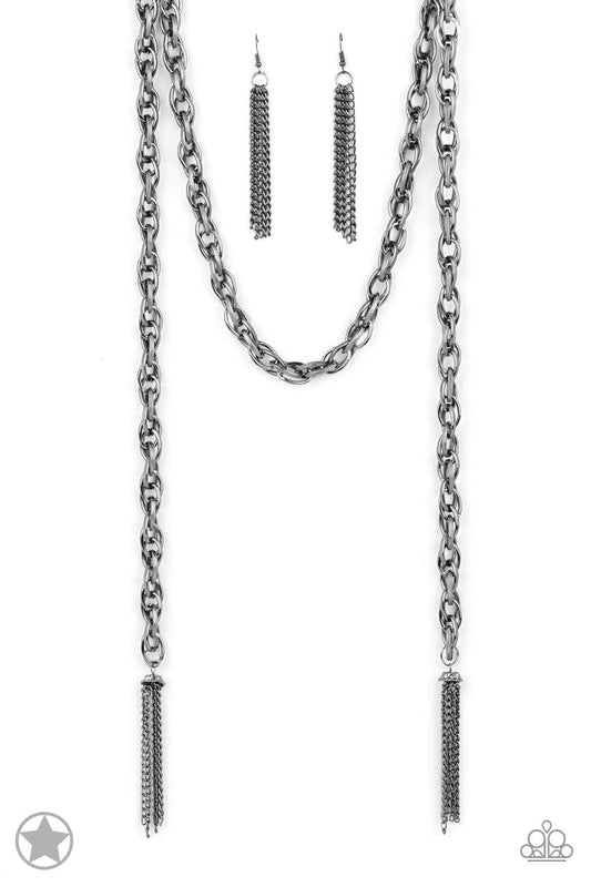 Paparazzi Accessories SCARFed for Attention - Gunmetal A single strand of spiraling, interlocking links with light-catching texture is anchored by two tassels of chain that add dramatic length to the piece. Undeniably the most versatile piece in Paparazzi