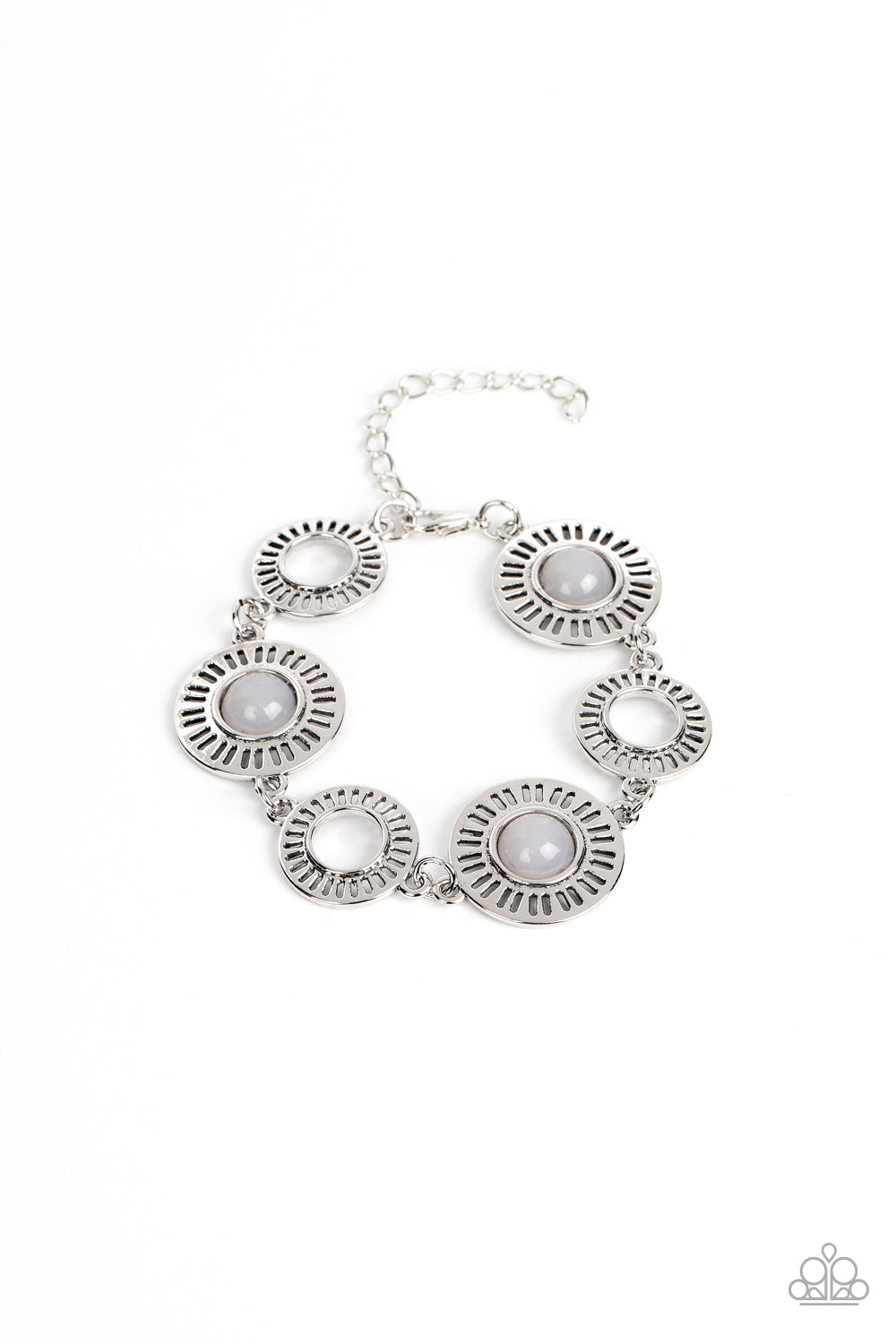 Paparazzi Accessories Coastal Charmer - Silver Airy silver frames radiate around open centers while larger silver frames feature linear cutouts with milky bead centers in the Pantone® of Northern Droplet. The cheerful designs link together around the wris