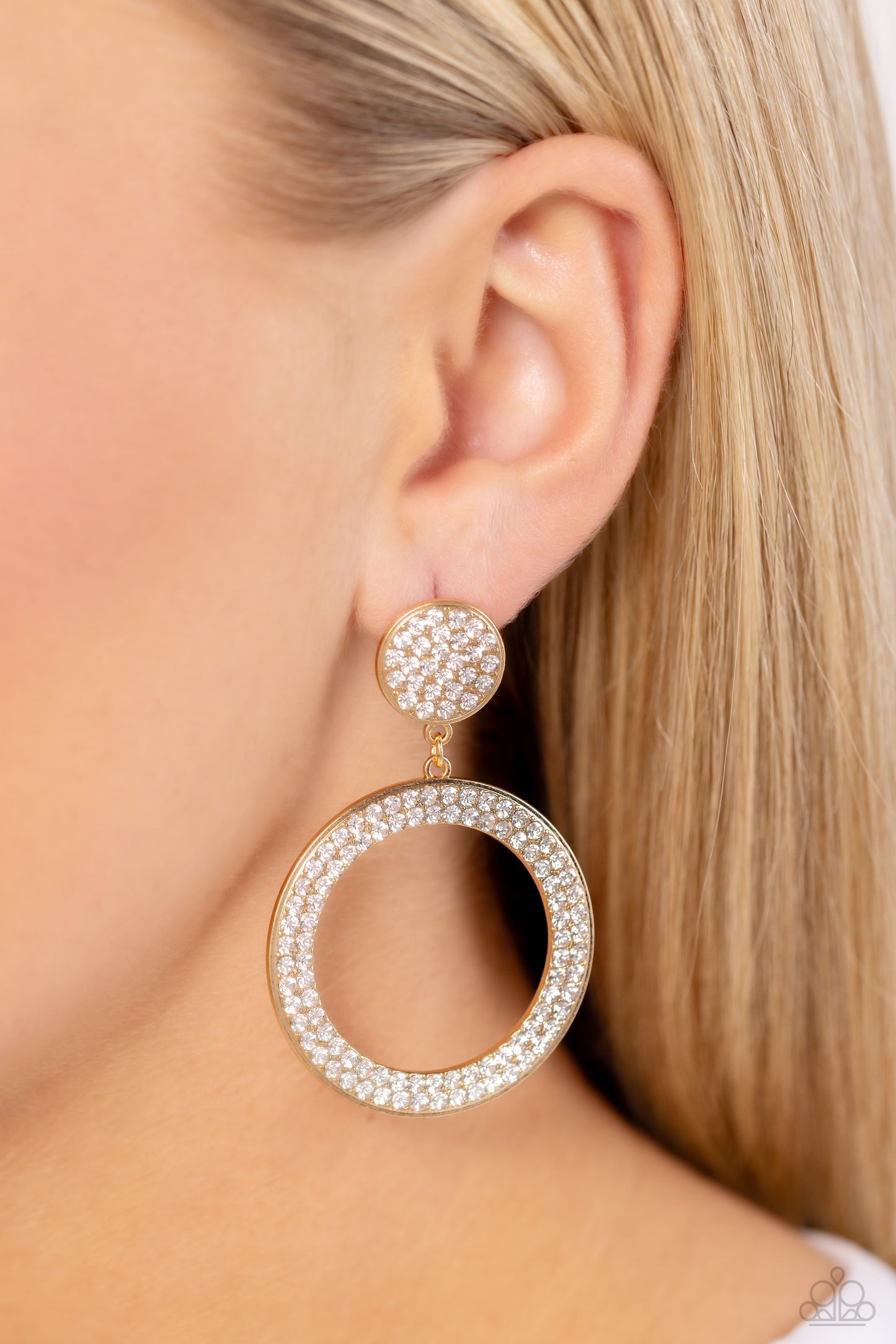 Paparazzi Accessories GLOW You Away - Gold Encrusted in rows of glassy white rhinestones, a flat gold hoop swings from the bottom of a white rhinestone dotted gold frame for a statement-making finish. Earring attaches to a standard post fitting. Sold as o