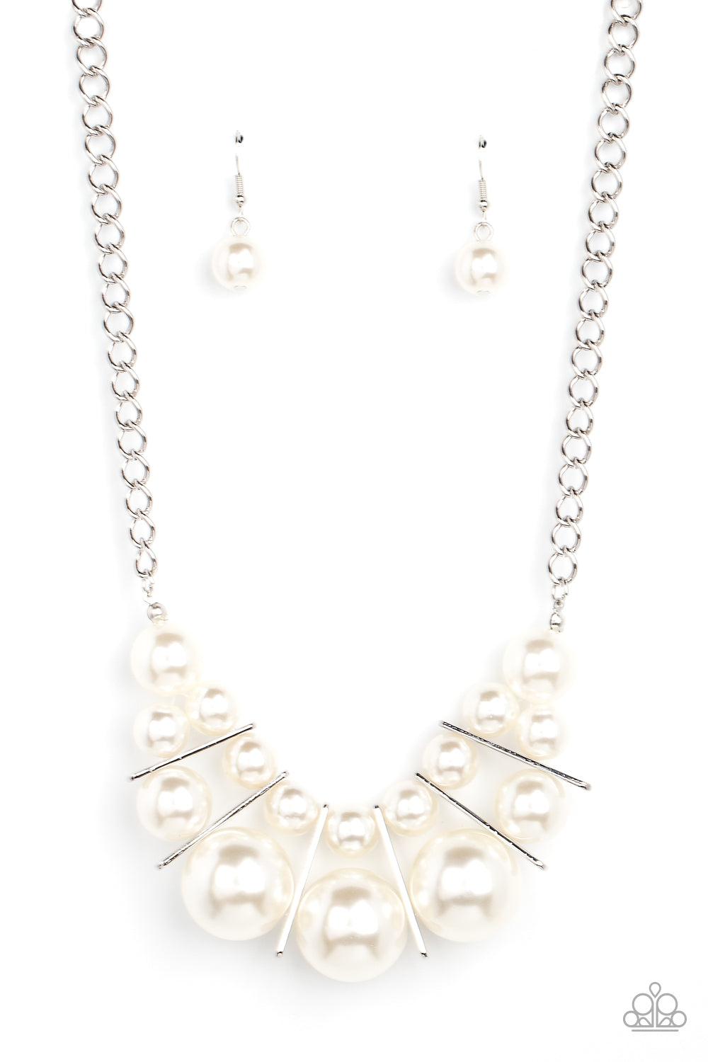Paparazzi Accessories Challenge Accepted - White Separated by rectangular silver frames, bubbly rows of classic and oversized white pearls are threaded along invisible wires at the bottom of a chunky silver chain for an effervescent explosion below the co