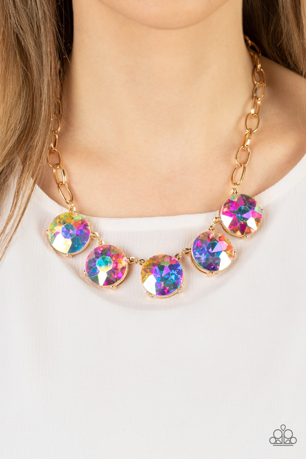 Paparazzi Accessories Limelight Luxury - Multi Set in gold pronged fittings, five dramatically oversized iridescent rhinestones connect across the collar and attach to an oversized gold chain creating a stunning spot-light loving statement piece. Features