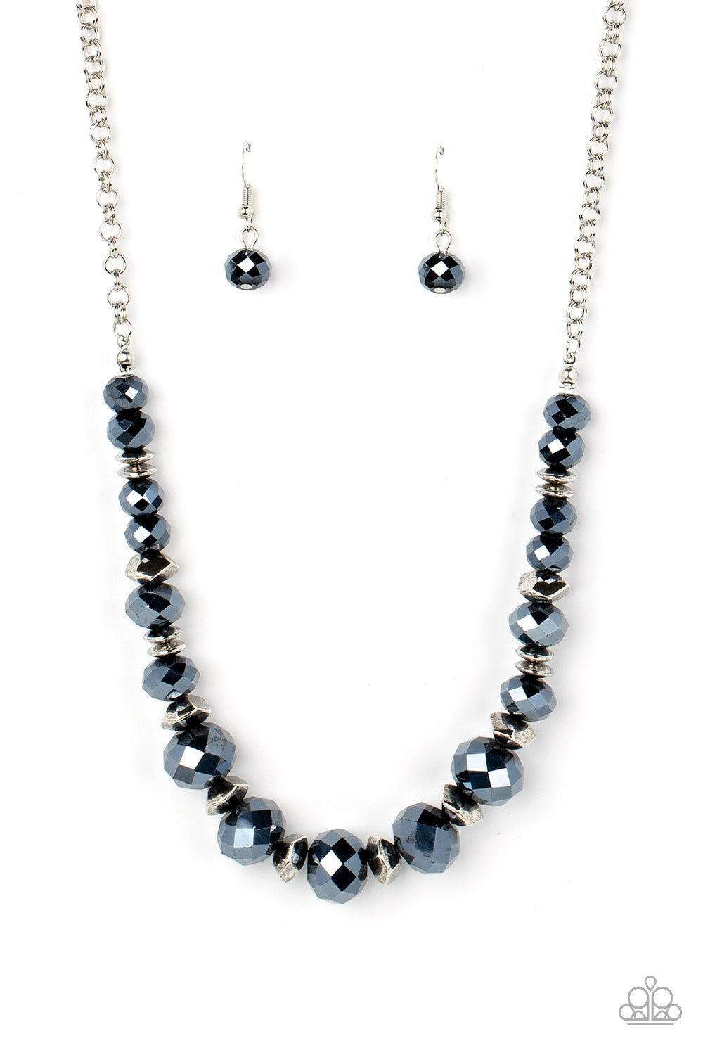 Paparazzi Accessories Cosmic Cadence - Blue Separated by silver discs and faceted silver accents, faceted blue crystal-like gems are threaded along an invisible wire below the collar for a stellar statement. Features an adjustable clasp closure. Sold as o