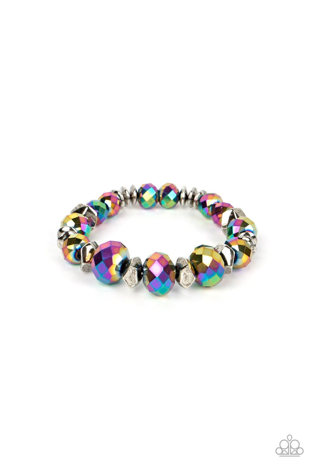 Paparazzi Accessories Astral Auras - Multi Separated by silver discs and faceted silver accents, faceted oil spill crystal-like gems are threaded along stretchy bands around the wrist for a stellar statement. Due to its prismatic palette, color may vary.
