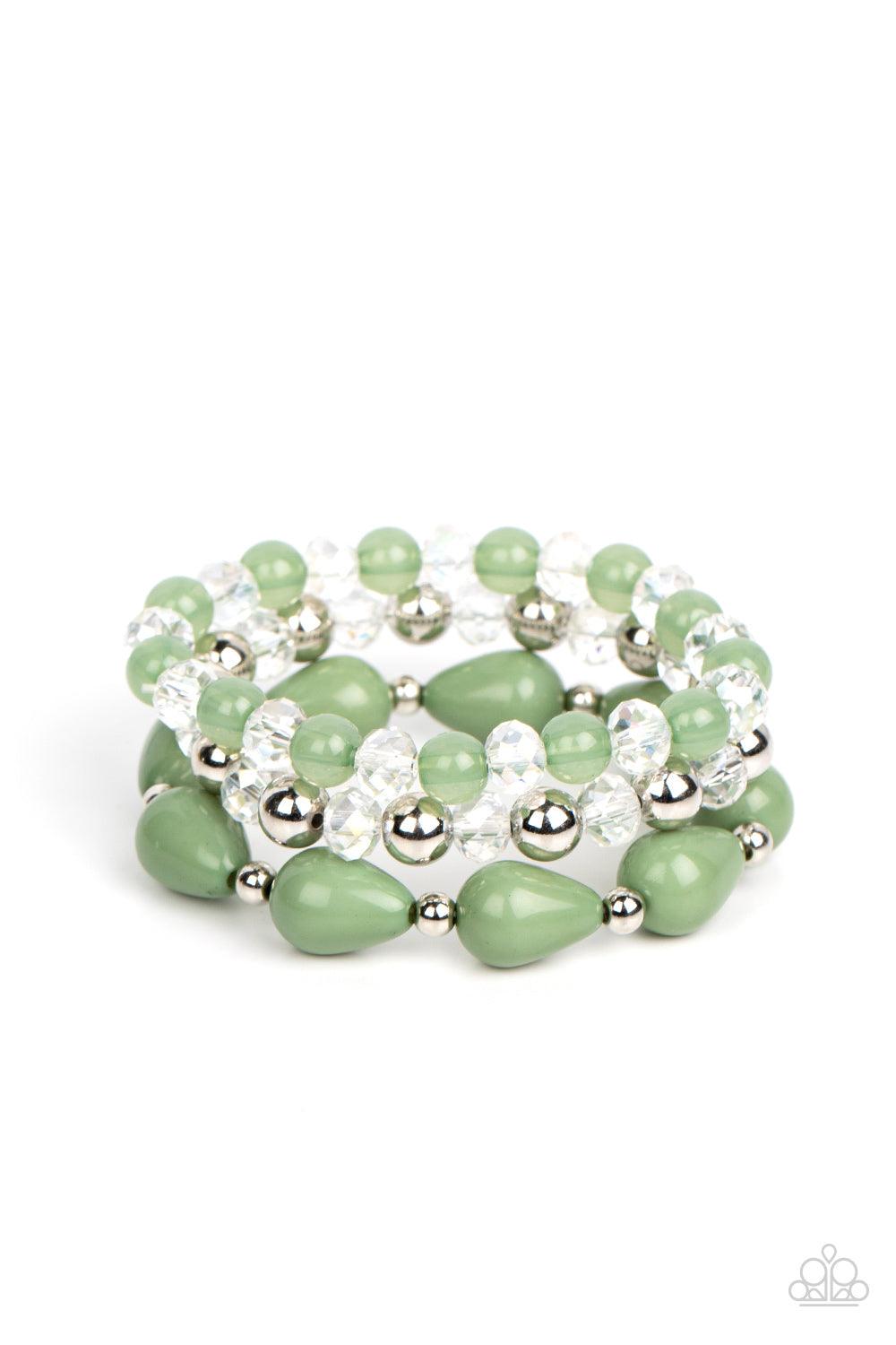 Paparazzi Accessories Beachside Brunch - Green A whimsical assortment of crystal-like beads, silver beads, opaque Basil beads, and Basil teardrop beads are threaded along stretchy bands around the wrist, resulting in colorful layers. Sold as one set of th