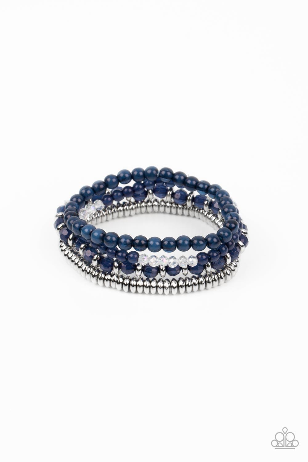 Paparazzi Accessories Destination Dreamscape - Blue A mismatched collection of opaque and crystal-like navy blue beads intermix with silver accents and white crystal-like beads along stretchy bands around the wrist, creating colorful layers. Sold as one s