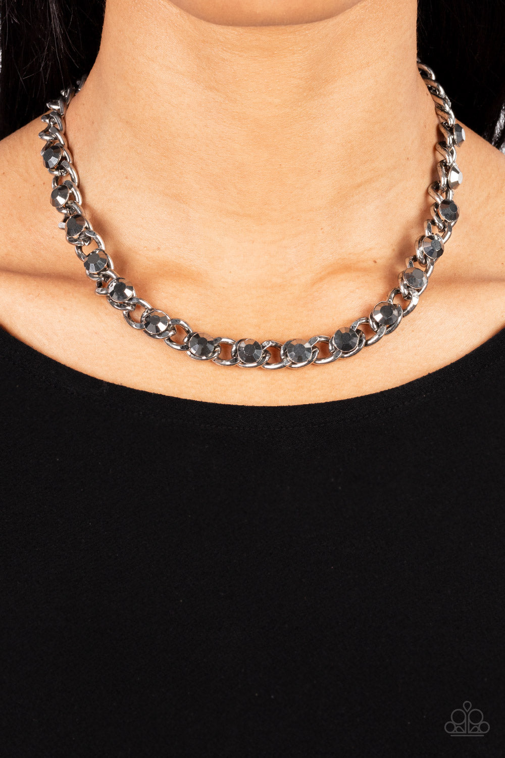 Paparazzi Accessories Major Moxie - Silver Oversized hematite rhinestones dot a row of oversized silver chain, resulting in a gritty glitz below the collar. Features an adjustable clasp closure. Sold as one individual necklace. Includes one pair of matchi