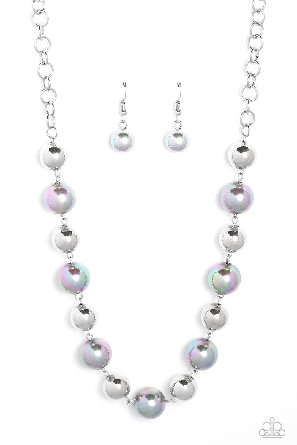 Paparazzi Accessories Dreamscape Escape - Silver Dipped in an iridescent finish, oversized silver pearls alternate with shiny silver beads below the collar for a dreamy pop of shimmer. Features an adjustable clasp closure. Sold as one individual necklace.