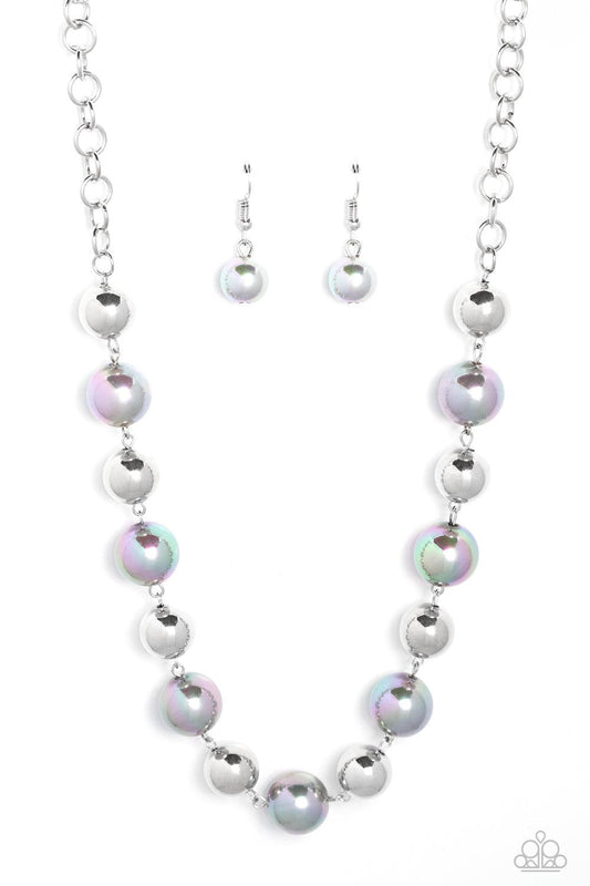 Paparazzi Accessories Dreamscape Escape - Silver Dipped in an iridescent finish, oversized silver pearls alternate with shiny silver beads below the collar for a dreamy pop of shimmer. Features an adjustable clasp closure. Sold as one individual necklace.