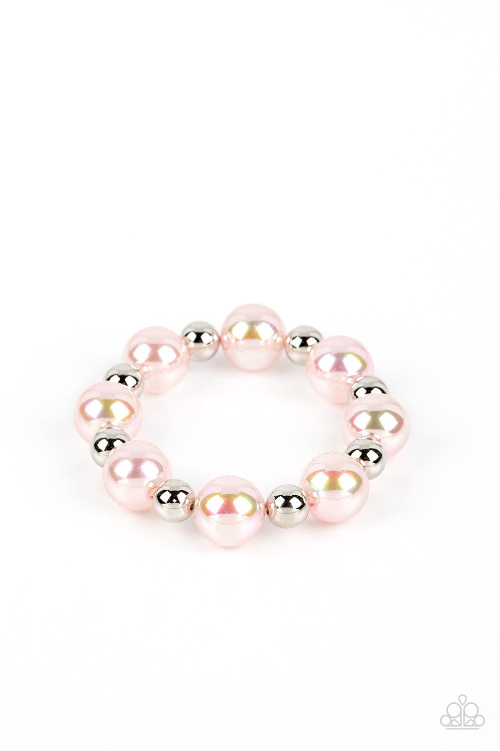 Paparazzi Accessories A DREAMSCAPE Come True - Pink Dipped in an iridescent finish, oversized Gossamer Pink pearls alternate with shiny silver beads along stretchy bands around the wrist for a dreamy pop of shimmer. Sold as one individual bracelet. Get Th