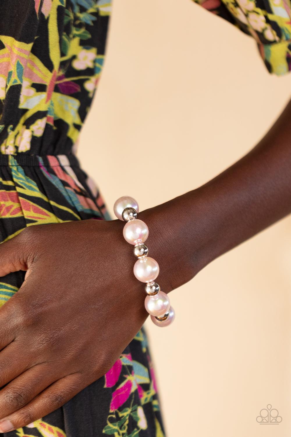 Paparazzi Accessories A DREAMSCAPE Come True - Pink Dipped in an iridescent finish, oversized Gossamer Pink pearls alternate with shiny silver beads along stretchy bands around the wrist for a dreamy pop of shimmer. Sold as one individual bracelet. Get Th