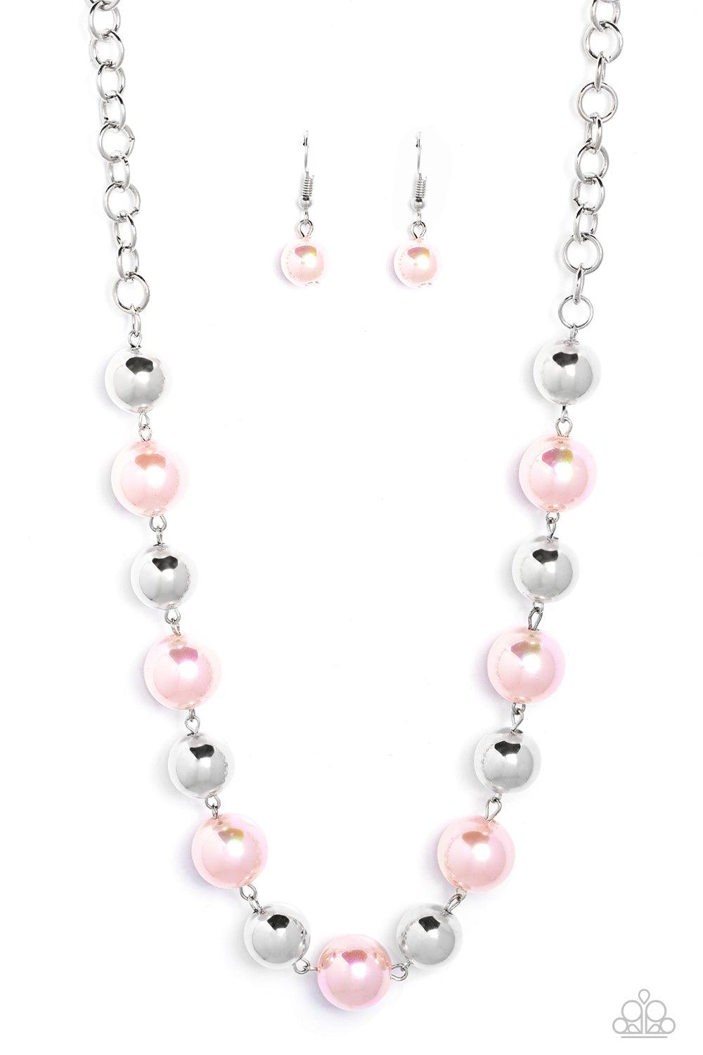 Paparazzi Accessories Dreamscape Escape - Pink Dipped in an iridescent finish, oversized Gossamer Pink pearls alternate with shiny silver beads below the collar for a dreamy pop of shimmer. Features an adjustable clasp closure. Sold as one individual neck