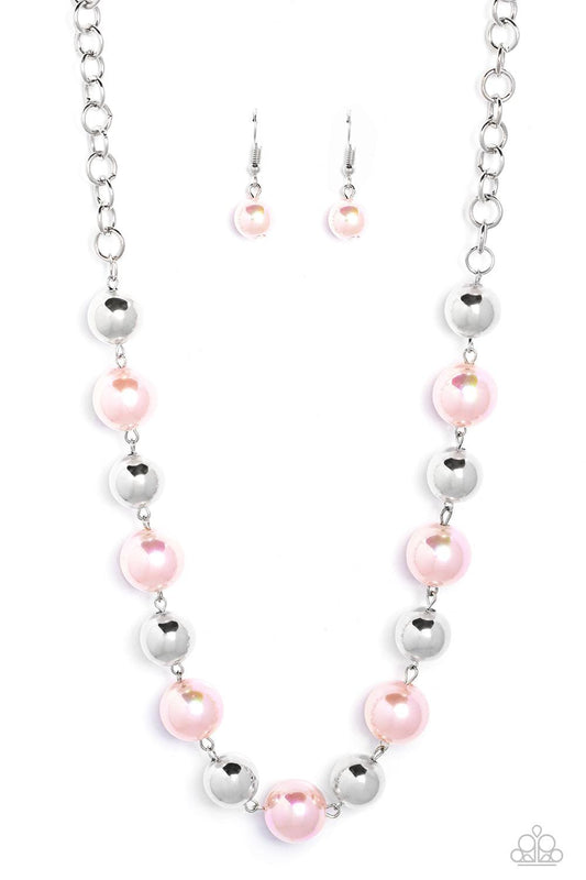 Paparazzi Accessories Dreamscape Escape - Pink Dipped in an iridescent finish, oversized Gossamer Pink pearls alternate with shiny silver beads below the collar for a dreamy pop of shimmer. Features an adjustable clasp closure. Sold as one individual neck