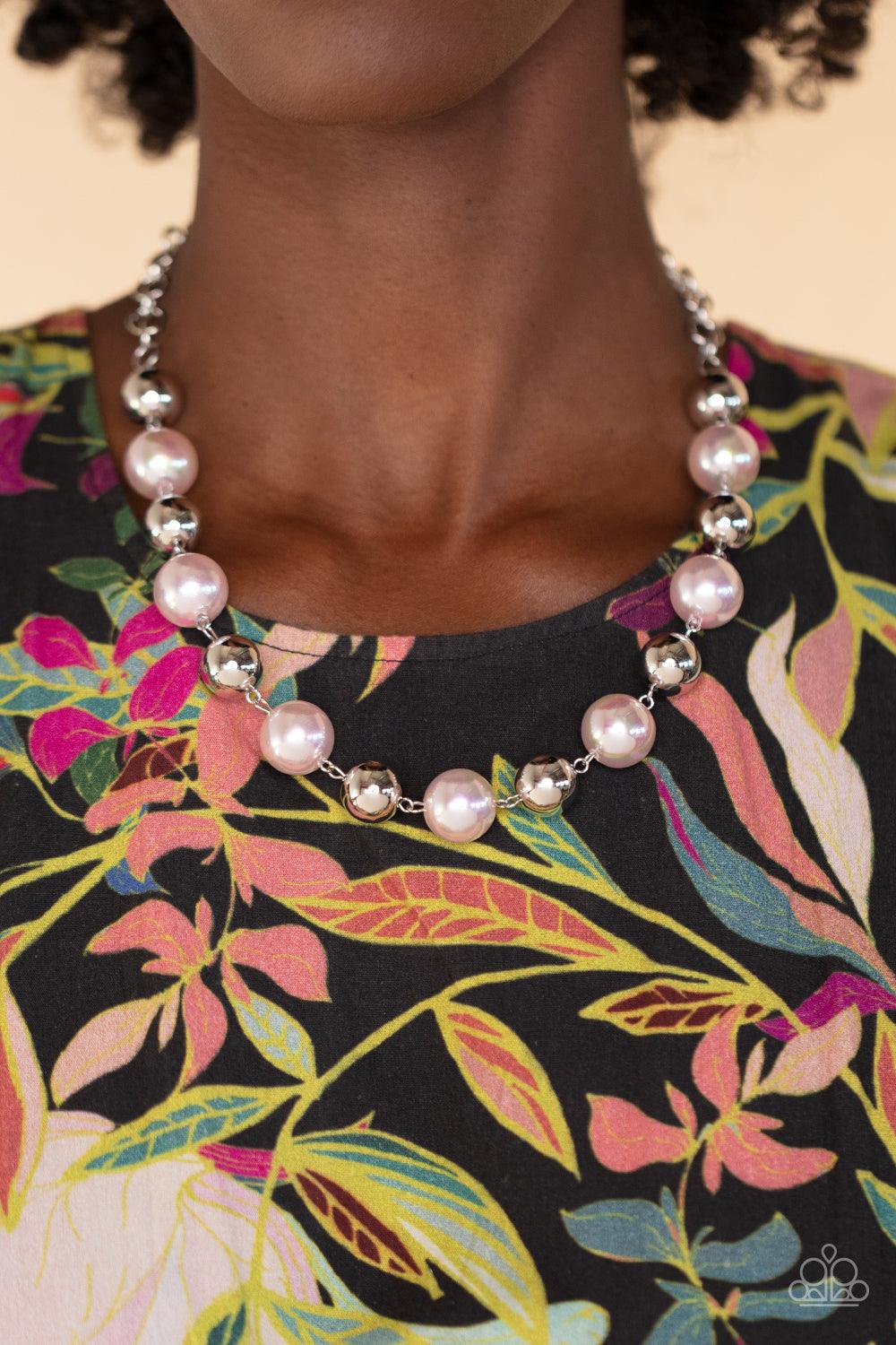 Paparazzi Accessories Dreamscape Escape - Pink Dipped in an iridescent finish, oversized Gossamer Pink pearls alternate with shiny silver beads below the collar for a dreamy pop of shimmer. Features an adjustable clasp closure. Sold as one individual neck