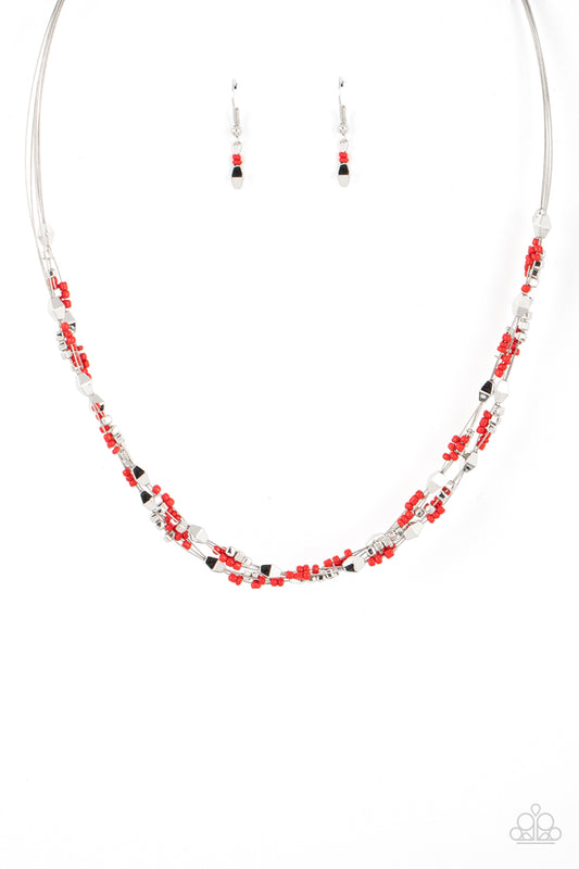 Paparazzi Accessories Explore Every Angle - Red A dainty collection of faceted silver beads, red seed beads, and silver cubes are threaded along multiple strands of silver wire below the collar, creating clustered layers. Features an adjustable clasp clos