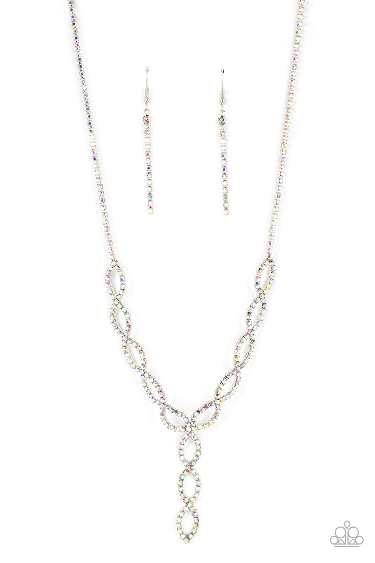 Paparazzi Accessories Infinitely Icy - Multi Strands of iridescent rhinestones delicately loop into interlocking infinities below the collar, drizzling into an icy extended pendant for a statement-making finish. Features an adjustable clasp closure. Sold