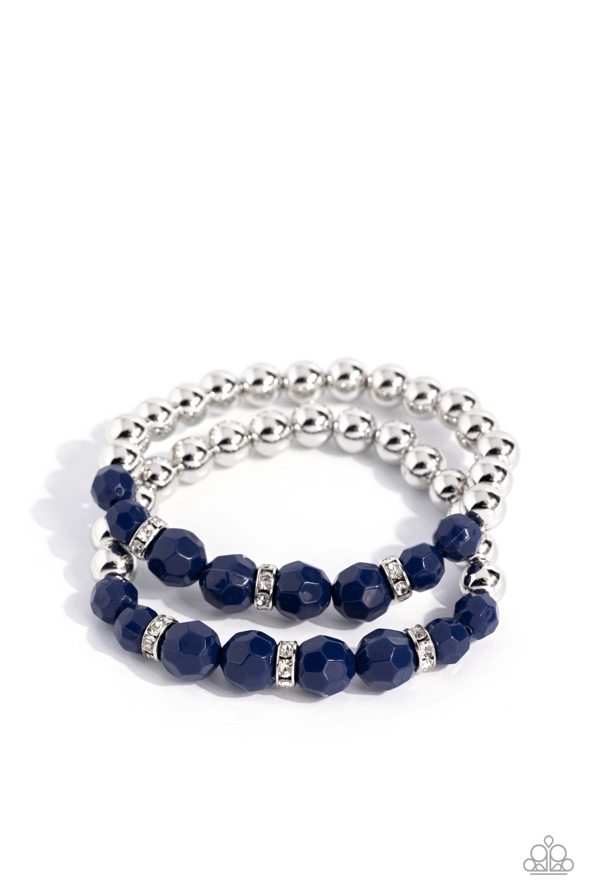 Paparazzi Accessories Two by Two Twinkle - Blue Infused with shiny silver beads, white rhinestone encrusted silver rings and faceted navy blue beads are threaded along a pair of stretchy bands around the wrist for a polished pop of color. Sold as one pair