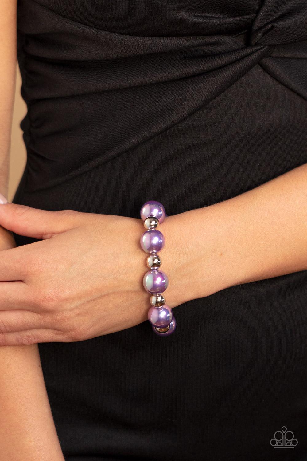 Paparazzi Accessories A DREAMSCAPE Come True - Purple Dipped in an iridescent finish, oversized lavender pearls alternate with shiny silver beads along stretchy bands around the wrist for a dreamy pop of shimmer. Sold as one individual bracelet. Get The C