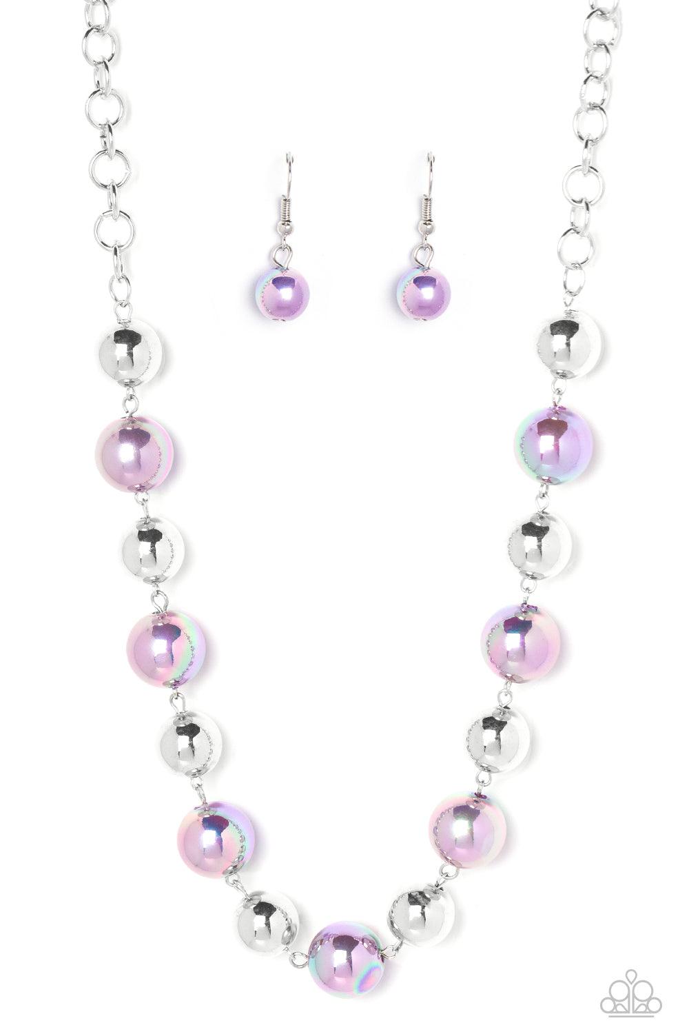 Paparazzi Accessories Dreamscape Escape - Purple Dipped in an iridescent finish, oversized lavender pearls alternate with shiny silver beads below the collar for a dreamy pop of shimmer. Features an adjustable clasp closure. Sold as one individual necklac