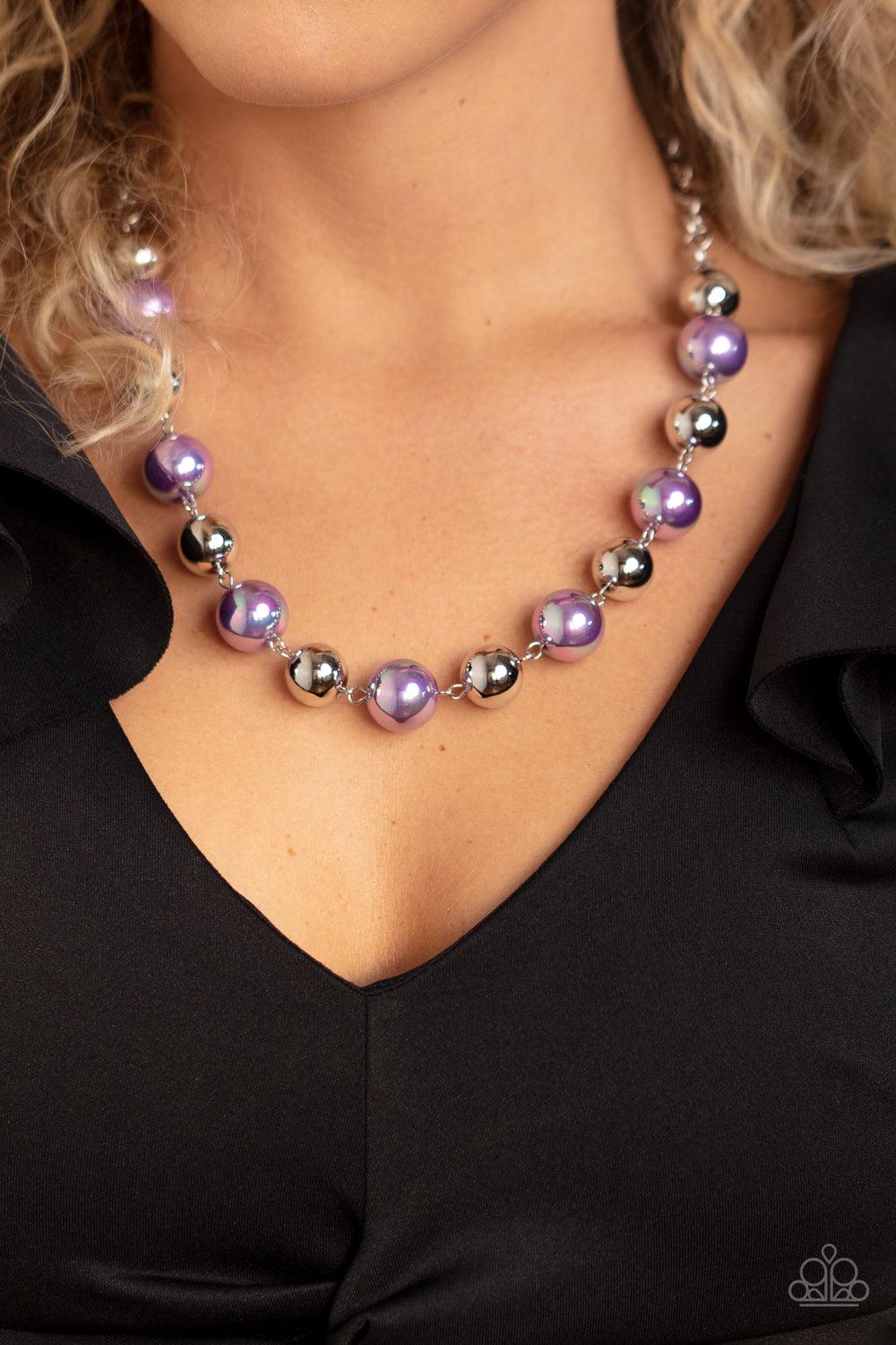 Paparazzi Accessories Dreamscape Escape - Purple Dipped in an iridescent finish, oversized lavender pearls alternate with shiny silver beads below the collar for a dreamy pop of shimmer. Features an adjustable clasp closure. Sold as one individual necklac