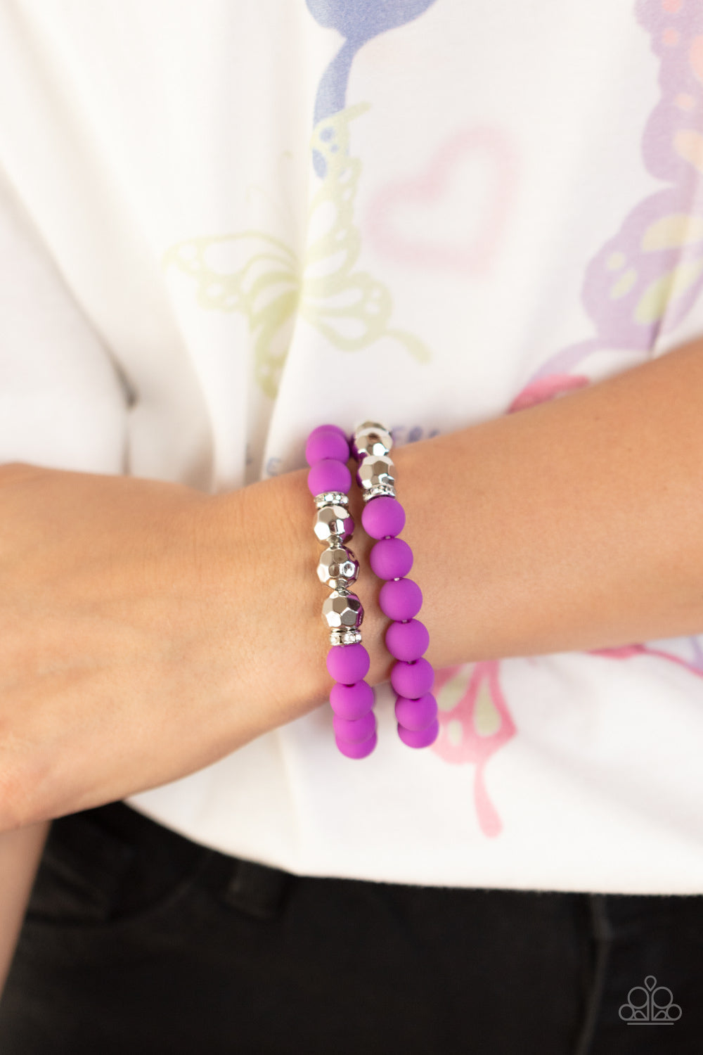 Paparazzi Accessories Dip and Dive - Purple White rhinestone encrusted rings flank a trio of faceted silver beads along a stretchy row of matte-finished Dahlia beads, creating a summery splash of color around the wrist. Sold as one pair of bracelets. Get