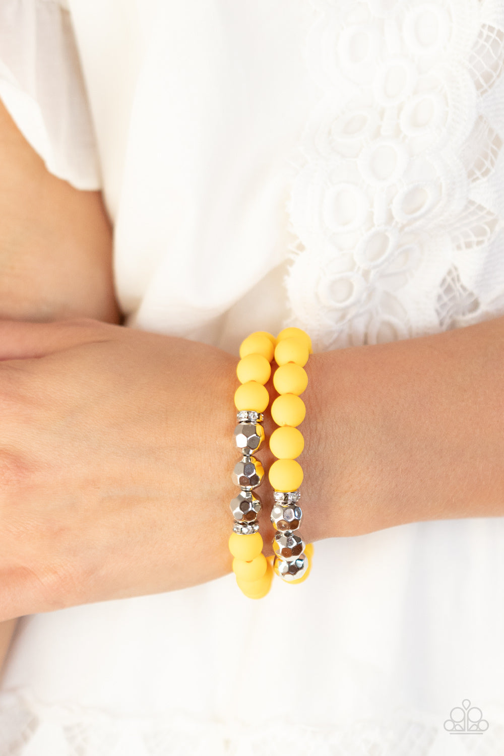 Paparazzi Accessories Dip and Dive - Yellow White rhinestone encrusted rings flank a trio of faceted silver beads along a stretchy row of matte-finished Daffodil beads, creating a summery splash of color around the wrist. Sold as one pair of bracelets. Ge