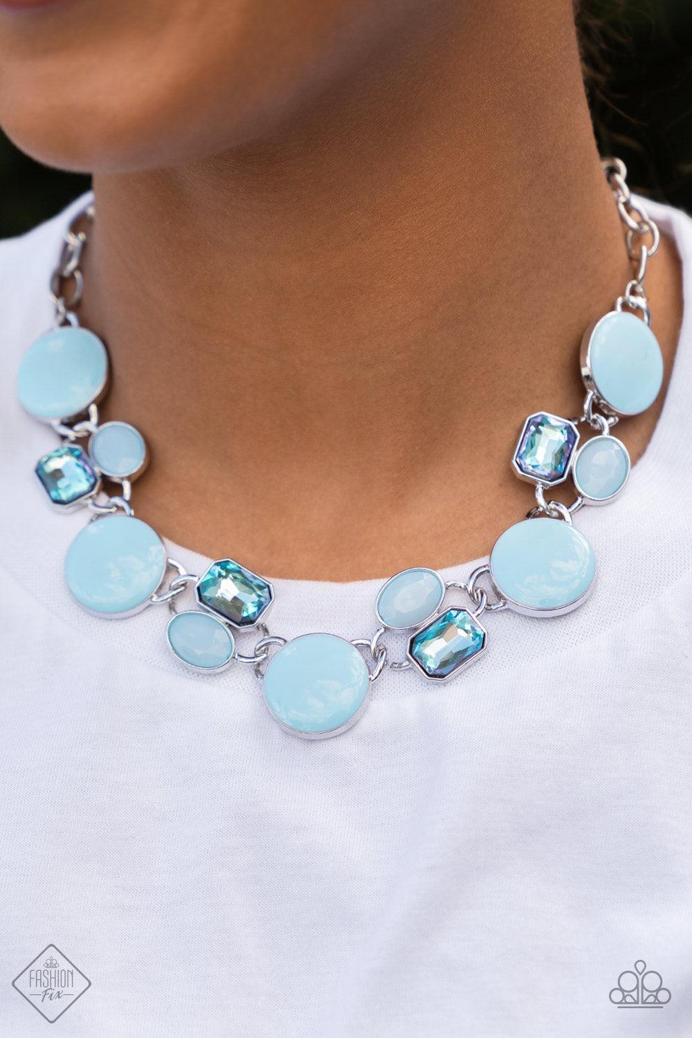 Paparazzi Accessories Dreaming in MULTICOLOR - Blue Featuring the sweet pastel of Spun Sugar, sparkling blue gems combine with milky blue beads and alternate across the collar with oversized discs painted in blue enamel. The whimsically modern collection