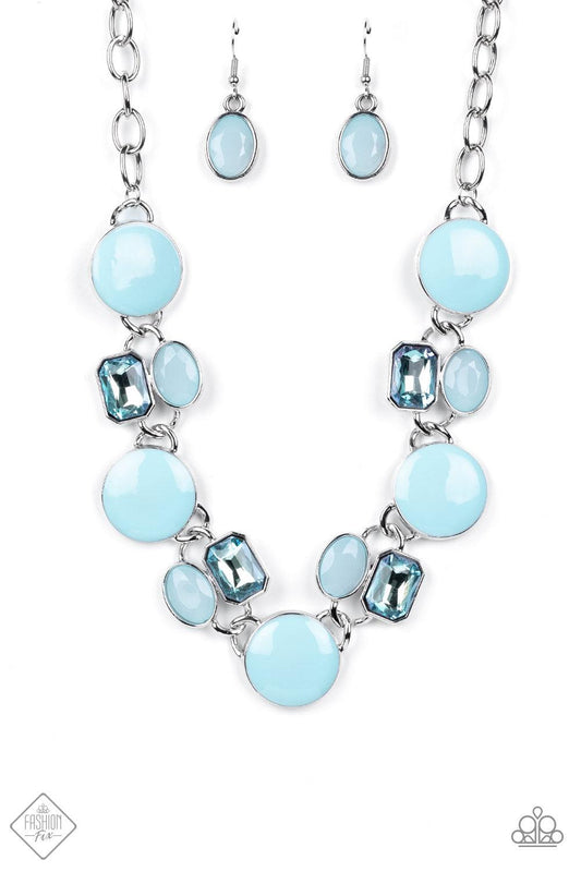 Paparazzi Accessories Dreaming in MULTICOLOR - Blue Featuring the sweet pastel of Spun Sugar, sparkling blue gems combine with milky blue beads and alternate across the collar with oversized discs painted in blue enamel. The whimsically modern collection