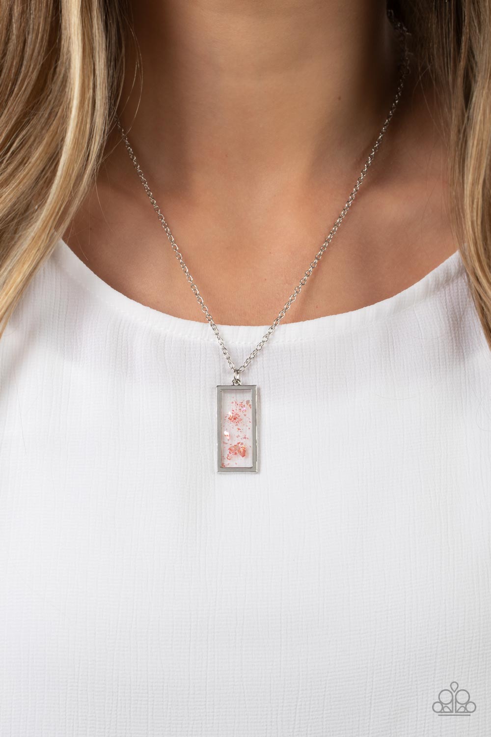 Paparazzi Accessories SEA You Around - Pink Flecks of iridescent pink shell are encased inside a glassy frame bordered in silver, creating a whimsical pendant below the collar. Features an adjustable clasp closure. Sold as one individual necklace. Include