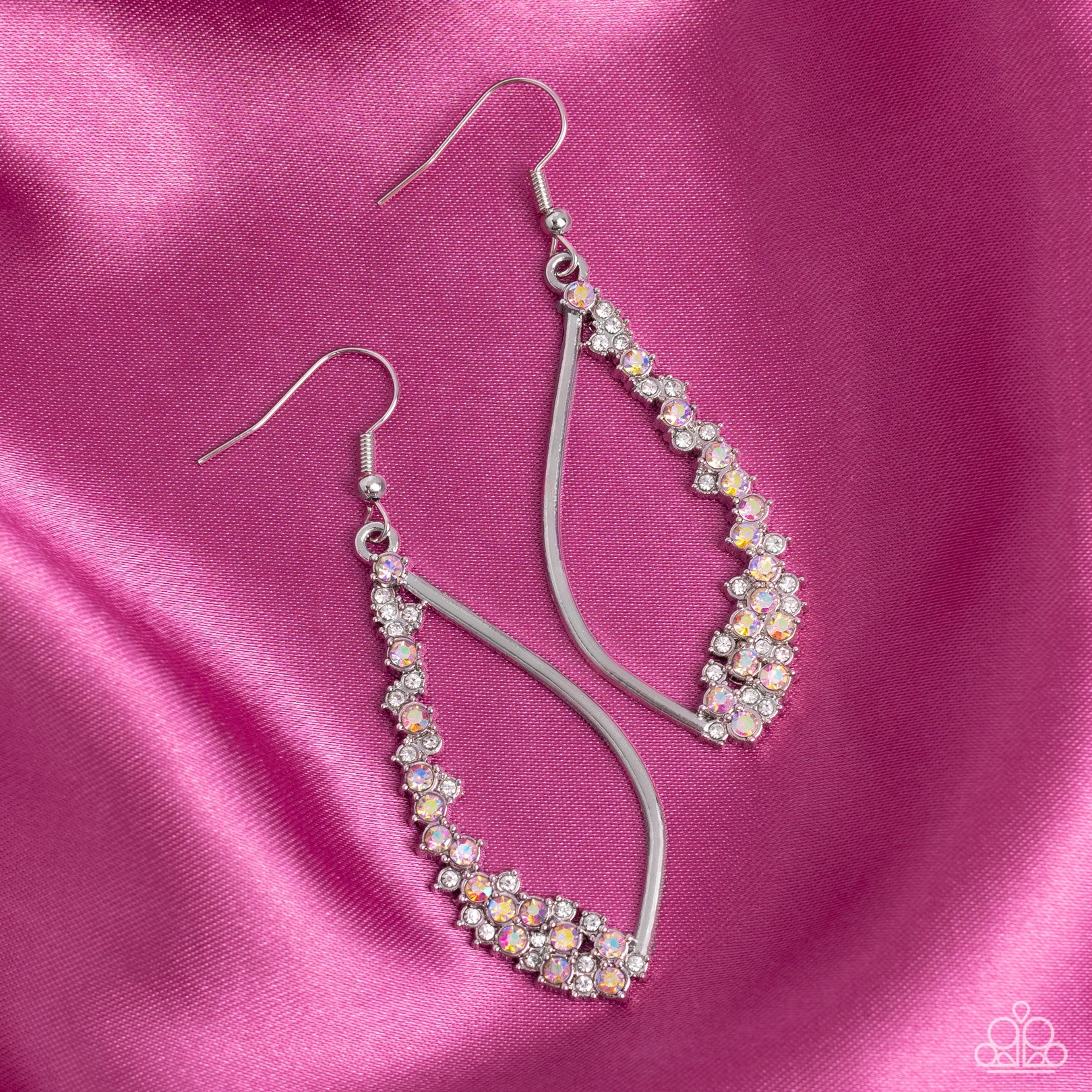 Paparazzi Accessories Sparkly Side Effects - Multi Set in silver pronged fittings, dainty white and iridescent rhinestones tumble down one side of an airy silver lure for a bubbly blast of sparkle. Earring attaches to a standard fishhook fitting. Due to i