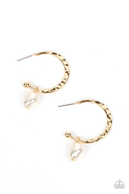 Paparazzi Accessories GLAM Overboard - Gold An imperfect white pearl glides along a hammered gold hoop, creating a timeless twist. Earring attaches to a standard post fitting. Hoop measures approximately 1" in diameter. Sold as one pair of hoop earrings.