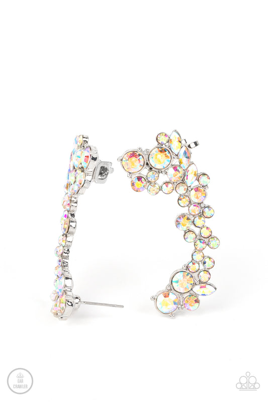 Paparazzi Accessories Astronomical Allure - Multi A sparkly collision of round and marquise cut iridescent rhinestones tumble down the ear, coalescing into an out-of-this-world sparkle. Features a clip-on fitting at the top for a secure fit. Due to its pr