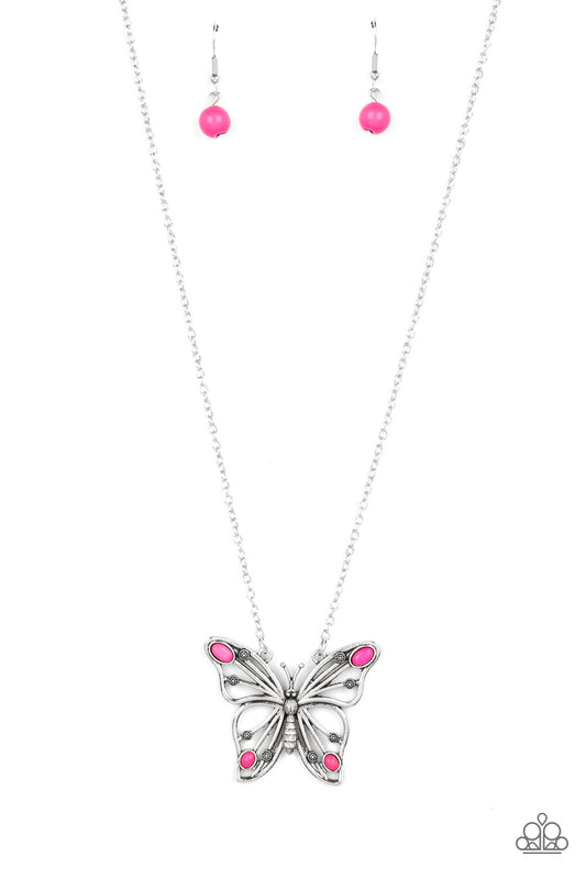 Paparazzi Accessories Badlands Butterfly - Pink Accented in oval pink stones, a decorative silver butterfly flutters at the bottom of a lengthened silver chain for a free-spirited finish. Features an adjustable clasp closure. Sold as one individual neckla