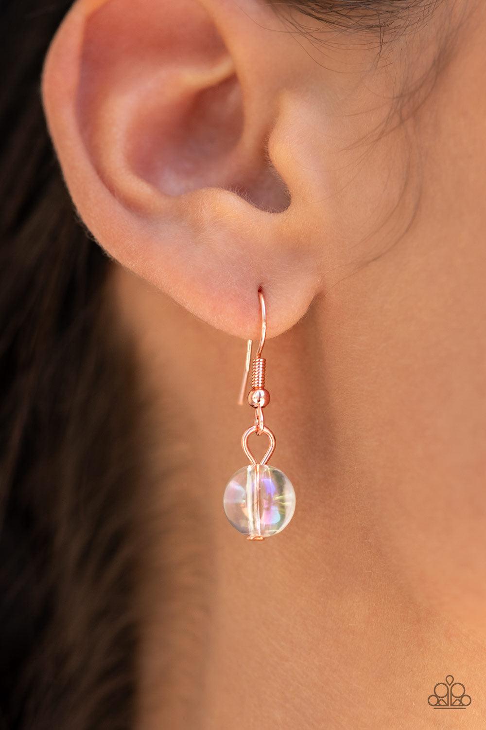 Paparazzi Accessories Deep Space Diva - Copper Featuring a stellar iridescence, pairs of glassy beads are separated by shiny copper discs, trickling below the collar in an effervescent fringe. Features an adjustable clasp closure. Due to its prismatic pal