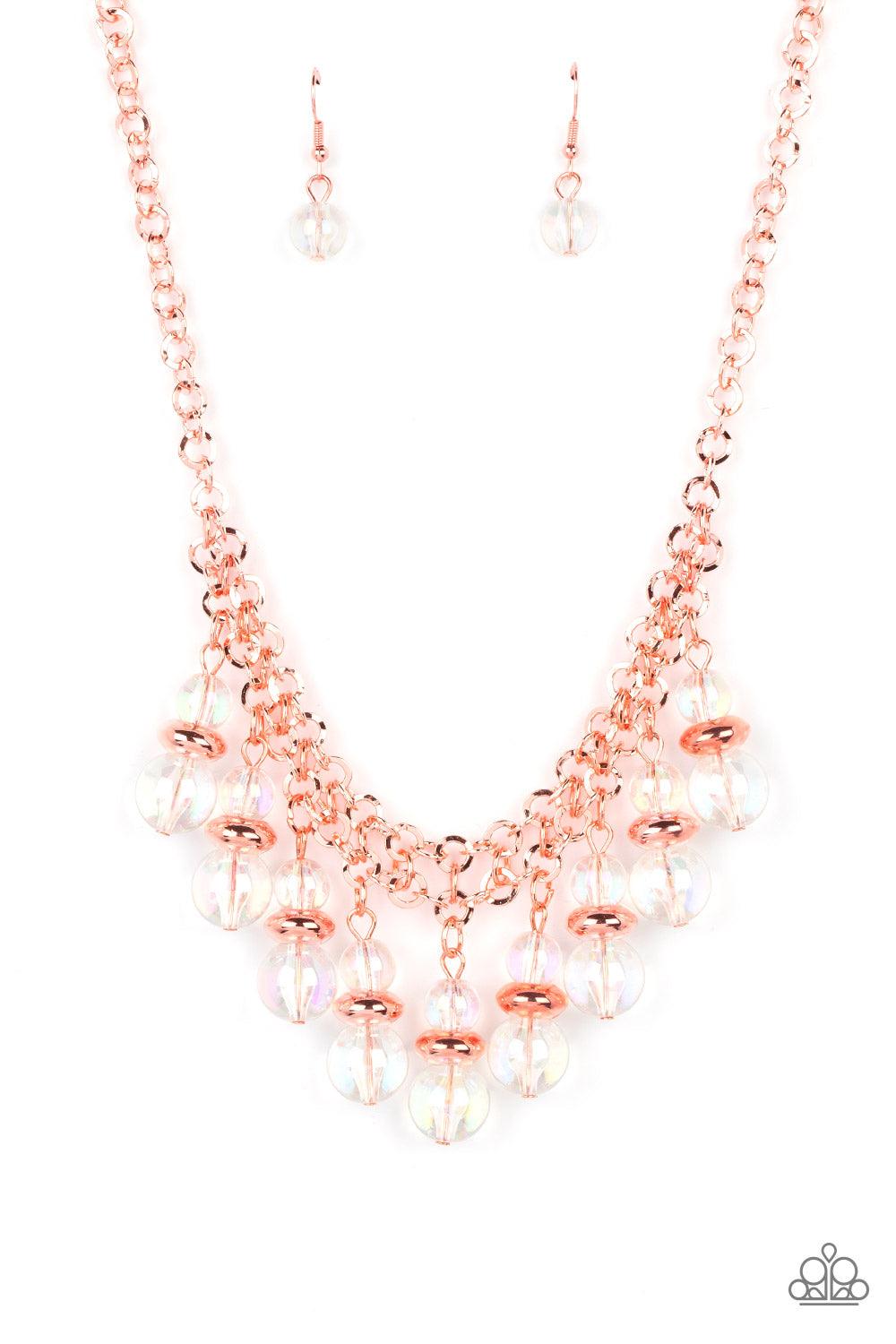 Paparazzi Accessories Deep Space Diva - Copper Featuring a stellar iridescence, pairs of glassy beads are separated by shiny copper discs, trickling below the collar in an effervescent fringe. Features an adjustable clasp closure. Due to its prismatic pal