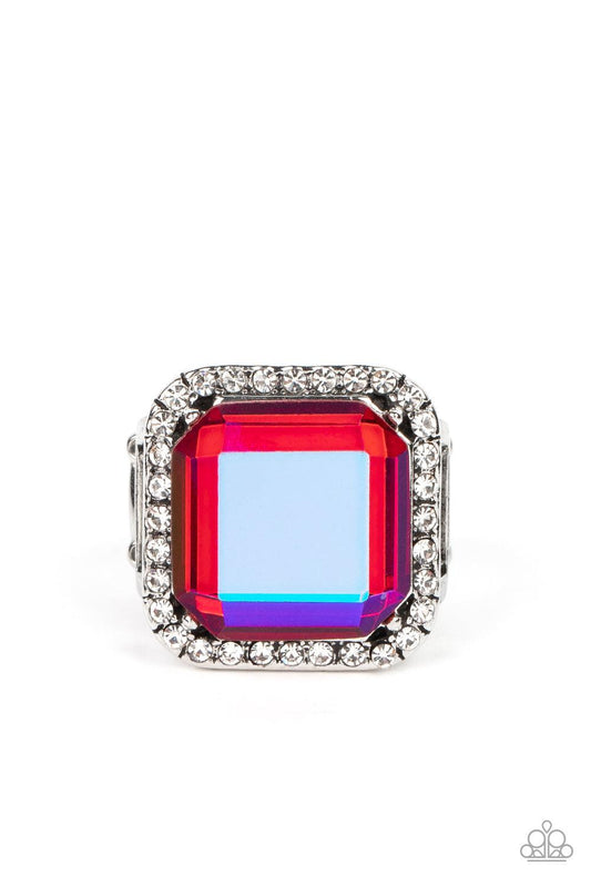 Paparazzi Accessories Slow Burn - Pink A lavish square iridescent pink gem, encased in a border of dainty white rhinestones, makes a head-turning centerpiece as it gleams with an industrial edge atop the finger. Features a stretchy band for a flexible fit