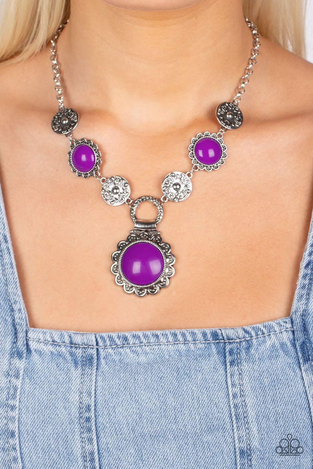 Paparazzi Accessories Poppy Persuasion - Purple Shiny oversized Dahlia beads are wrapped in floral-inspired frames of silver, filled with studded texture. Silver discs embossed in a filigree motif alternate with the vibrant beads as they link along the co