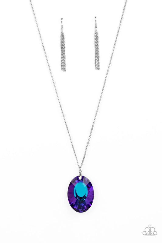 Paparazzi Accessories Celestial Essence - Blue Featuring a blue reflective focal point and an exaggerated faceted surface, a dramatically oversized, blue iridescent gem sparkles at the bottom of a lengthened silver chain for an out-of-this-world kind of d