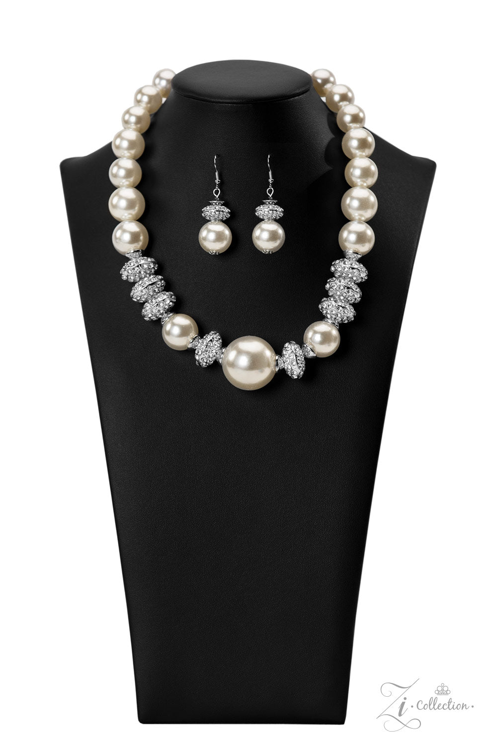 Paparazzi Accessories Noble Exaggerated white pearls gradually increase in size as they fall along the neckline, leading to a prominent centerpiece. The refined palette is complemented by shimmery silver accents, interspersed throughout the polished pearl