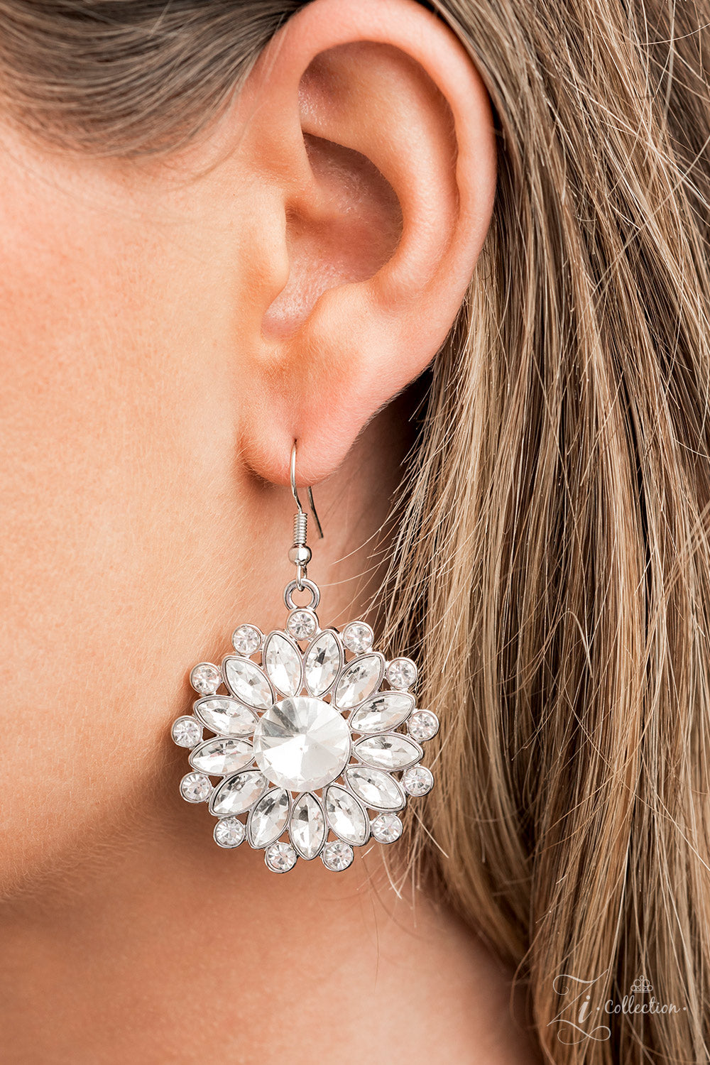 Paparazzi Accessories Optimistic Oversized classic white rhinestones are encircled by majestic marquise-cut rhinestones in the same radiant finish, creating a collection of stunning floral frames. Smaller white rhinestones fall in between each gorgeous ma