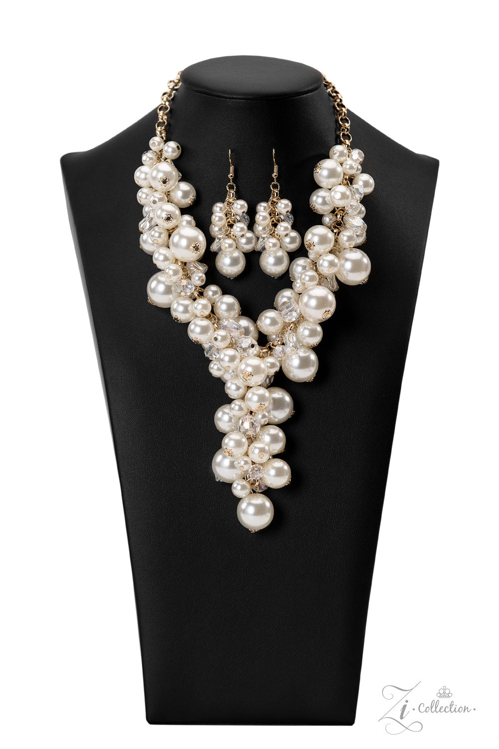 Paparazzi Accessories Flawless Imperfect glass-like beads and faceted clear beads are brushed in a hint of iridescence, allowing them to shimmer amongst an effervescent collection of classic and oversized white pearls. Dramatically clustered along a shiny