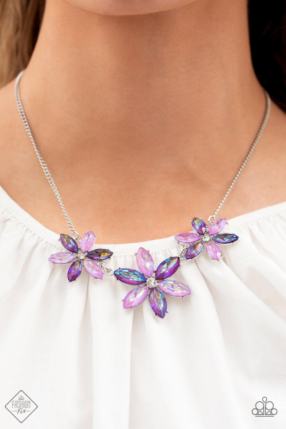 Paparazzi Accessories Meadow Muse - Purple Dark and light purple marquise cut rhinestones gather into whimsical flowers dotted with brilliant white rhinestone centers. The sparkling purple gems are set in pronged settings and connect to a dainty silver ch