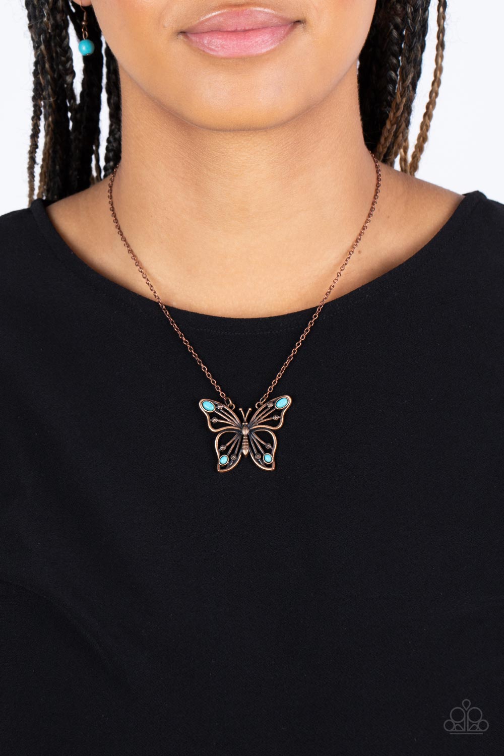 Paparazzi Accessories Badlands Butterfly - Copper Accented in oval turquoise stones, a decorative copper butterfly flutters at the bottom of a copper chain for a free-spirited finish. Features an adjustable clasp closure. Sold as one individual necklace.